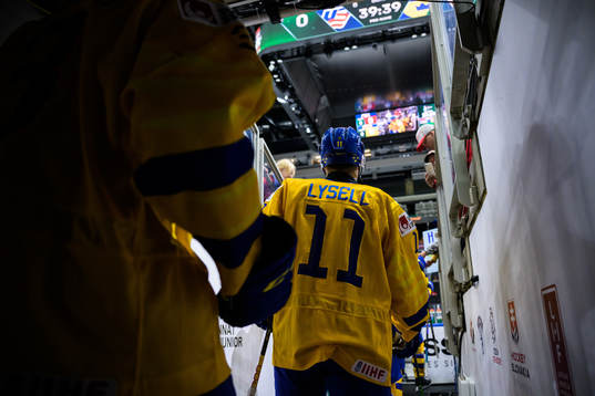 Fabian Lysell of Sweden enters the ice for warm-up