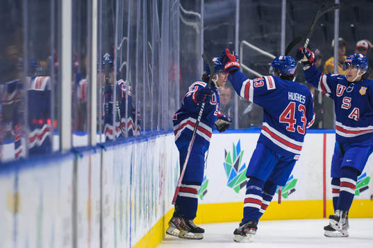 Brett Berard and Luke Hughes of USA celebrate the 1-0 goal