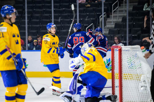 Matt Knies and Matthew Coronato of USA celebrate the 2-0