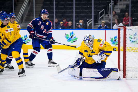 Goaltender Jesper Wallstedt of Sweden makes a save