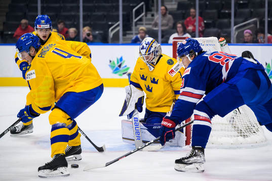 Emil Andrae, William Wallinder and goaltender Jesper