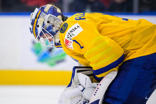 Goaltender Jesper Wallstedt of Sweden looks dejected
