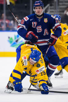 Victor Stjernborg of Sweden gets tackled by Hunter McKown