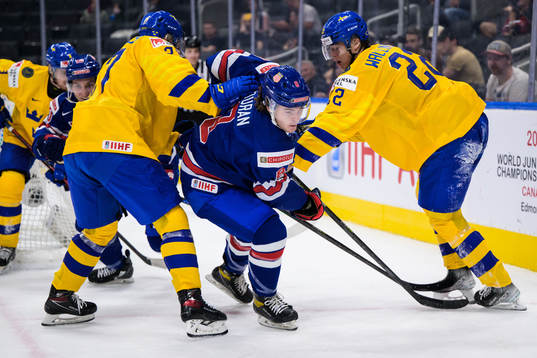 Theodor Niederbach and William Wallinder of Sweden try to