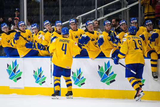 Emil Andrae of Sweden celebrates with teammates