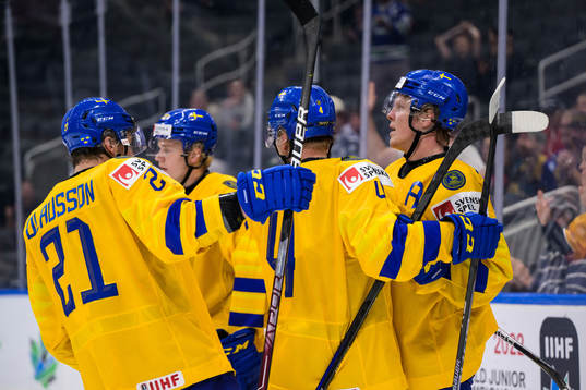 Åke Stakkestad of Sweden celebrates with teammates
