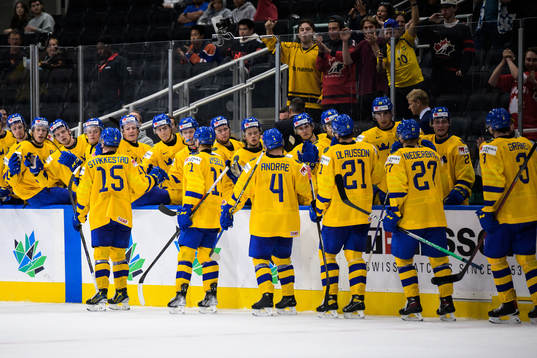 Åke Stakkestad of Sweden celebrates with teammates