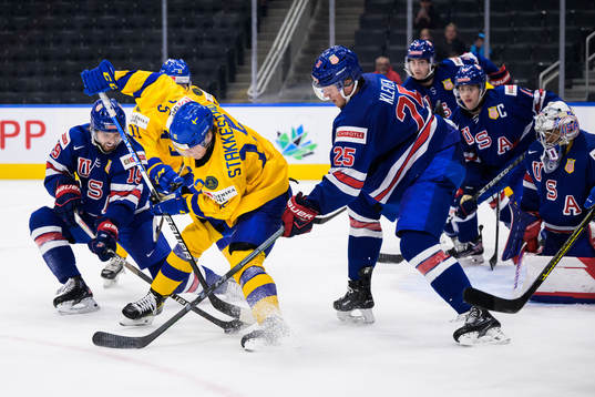 Åke Stakkestad of Sweden challenges Landon Slaggert and