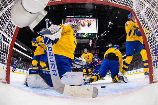 Goaltender Jesper Wallstedt of Sweden looks dejected