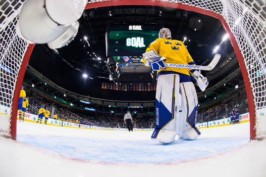 Goaltender Jesper Wallstedt of Sweden looks dejected