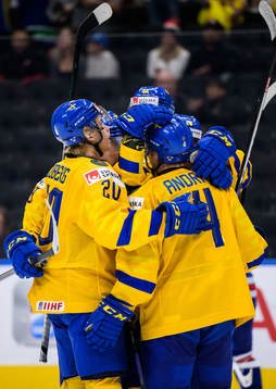 Albert Sjöberg and Emil Andrae of Sweden celebrate the 3-1