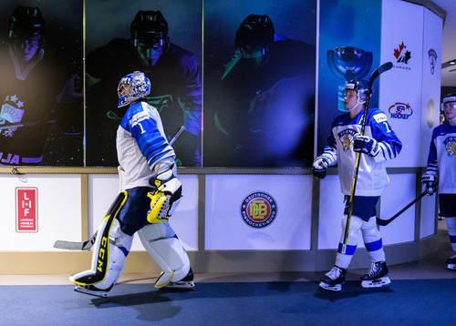 Goaltender Leevi Meriläinen and Kasper Puutio of Finland