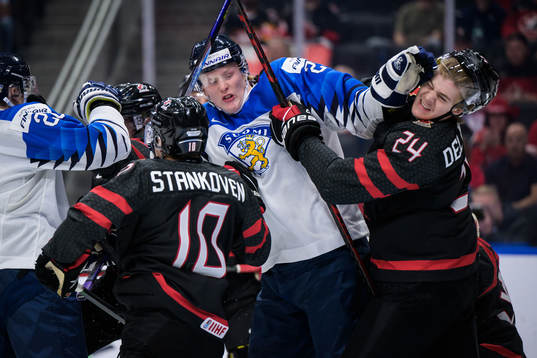 Samuel Helenius of Finland fights with Ethan del Mastro of