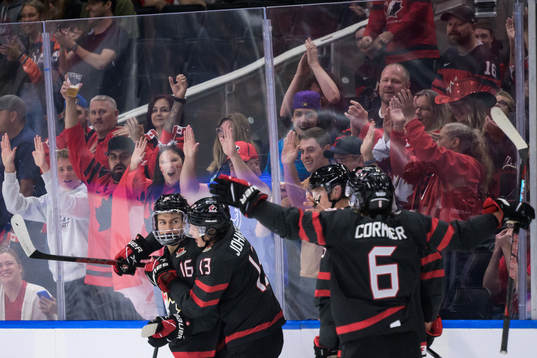 Connor Bedard, Kent Johnson and Lukas Cormier of Canada