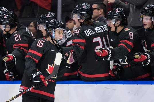 Connor Bedard of Canada celebrates