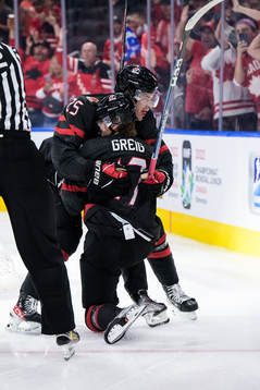 William Dufour and Ridly Greig of Canada celebrate the 4-1