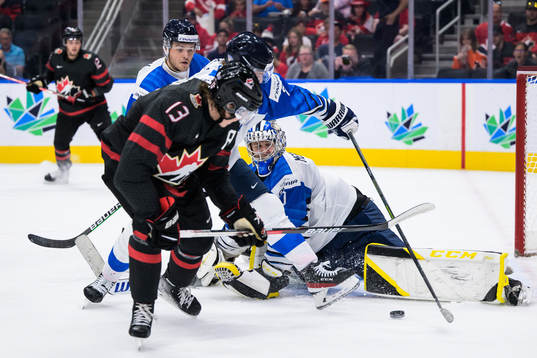 Kent Johnson of Canada in front of goaltender Leevi