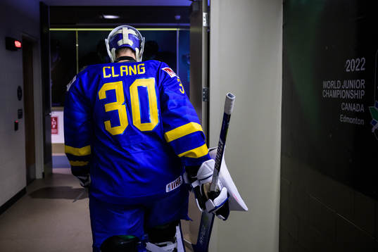 Goaltender Calle Clang of Sweden walks towards the ice for