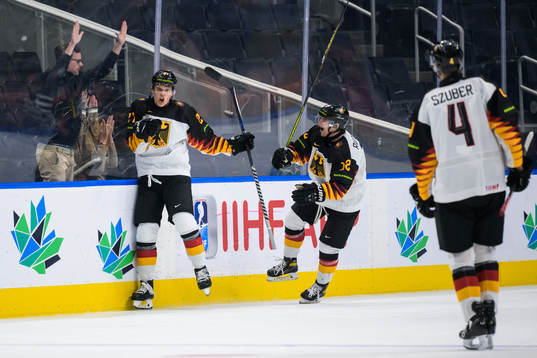 Bennet Rossmy and Maciej Rutkowski of Germany celebrate the