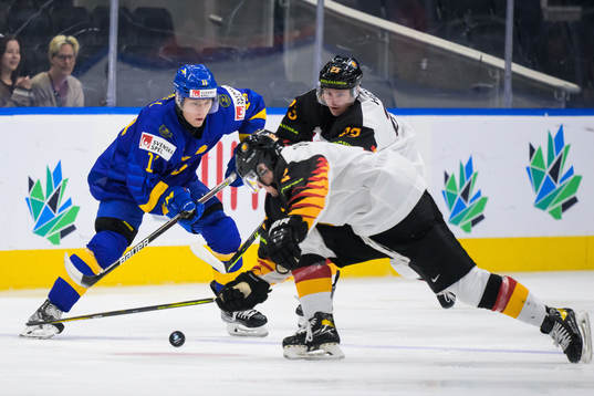 Fabian Lysell of Sweden challenges Maciej Rutkowski and