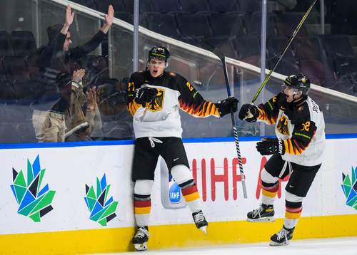 Bennet Rossmy and Maciej Rutkowski of Germany celebrate the