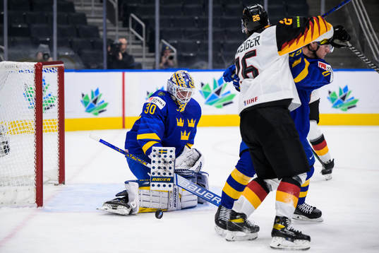 Goaltender Calle Clang of Sweden makes a save