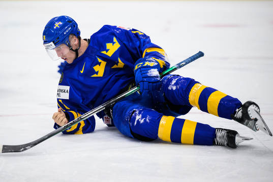 Linus Sjödin of Sweden lies down being hurt