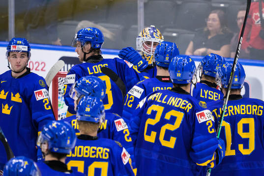 Players of Sweden celebrate