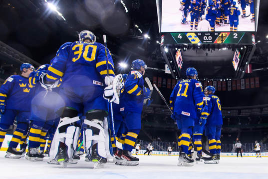Players of Sweden celebrate