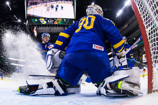 Åke Stakkestad and goaltender Calle Clang of Sweden