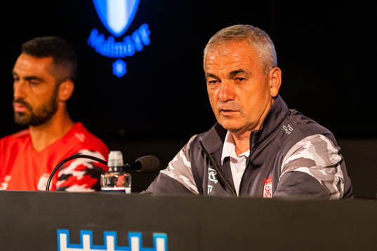 Head coach Riza Calimbay