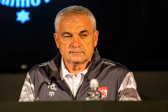 Head coach Riza Calimbay