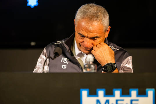 Head coach Riza Calimbay looks dejected