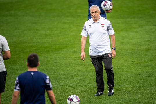 Head coach Riza Calimbay