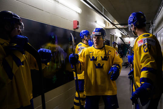 Emil Andrae of Sweden waiting to walk out to the ice for