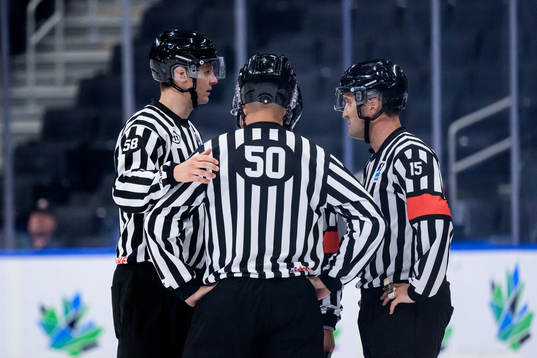 The referees discuss