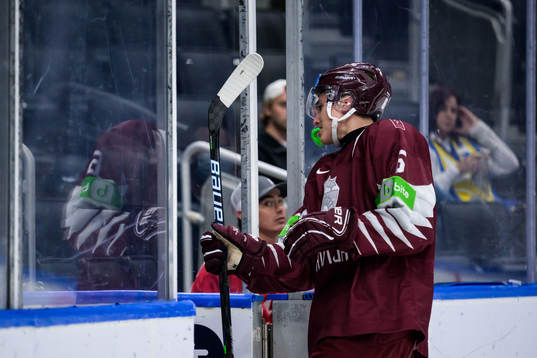 Martins Lavins of Latvia leaves the ice