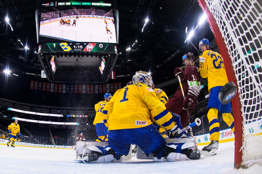 Goaltender Jesper Wallstedt of Sweden lets in the 1-1 goal
