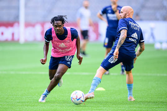 Joel Asoro and Magnus Eriksson of Djurgården