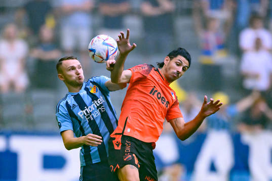Piotr Johansson of Djurgården and Marios Ilia of Apoel