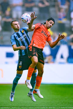 Piotr Johansson of Djurgården and Marios Ilia of Apoel