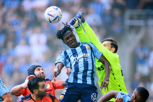 Joel Asoro of Djurgården and goalkeeper Vid Belec of Apoel