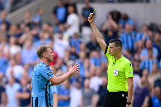 Rasmus Schüller of Djurgården receives a yellow card