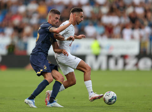 Mikael Lustig of AIK and Daniel Holzer of Slovacko