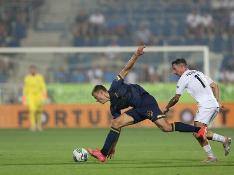 Erik Ring of AIK and Milan Petrzela of Slovacko