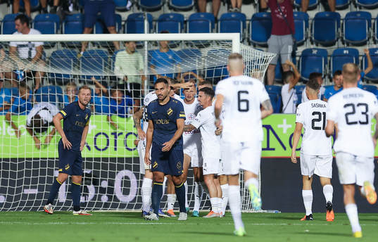 Vlasiy Sinyavskiy of Slovacko celebrates