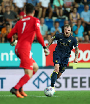 Goalkeeper Filip Nguyen of Slovacko and John Guidetti of AIK