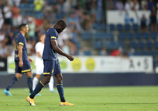 Benjamin Mbunga Kimpioka of AIK looks dejected