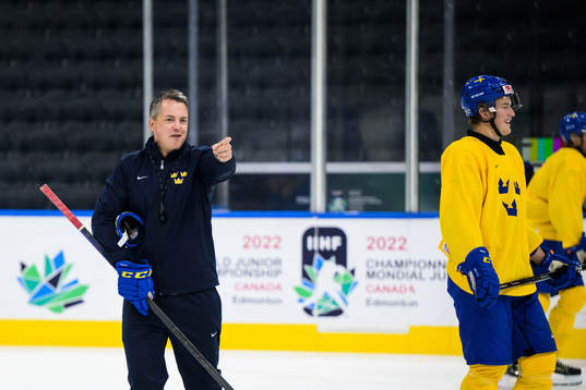 Head coach Tomas Montén and Oskar Olausson of Sweden at a
