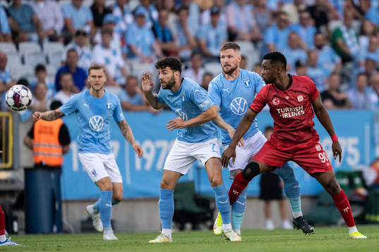 Erdal Rakip of Malmö FF and Leke James of Sivasspor